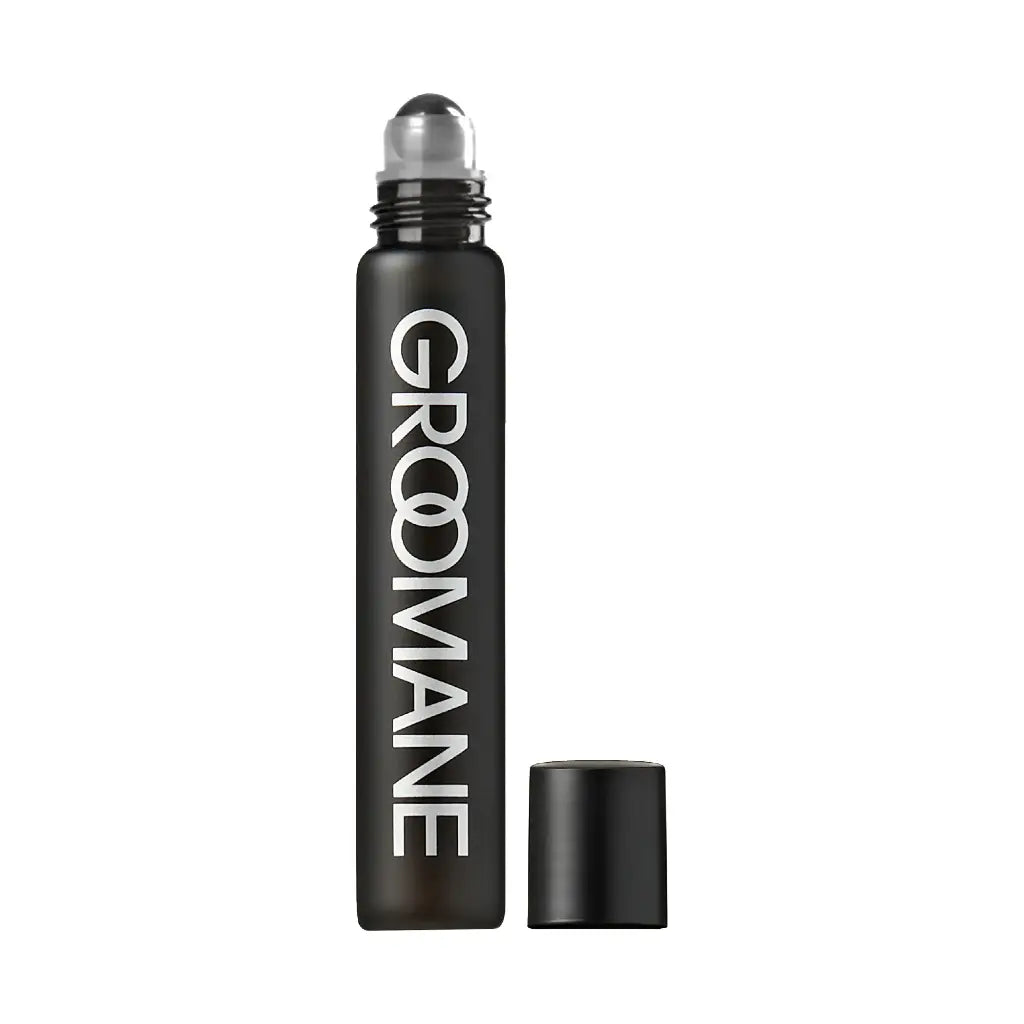 Black rollerball bottle with 'Groomane' branding on a white background