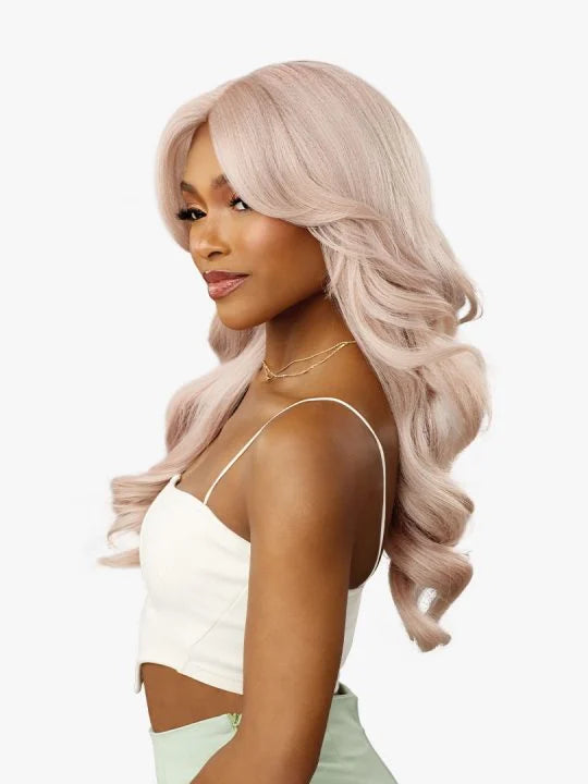 Celestia V-Part Wig styled with loose body waves on model
