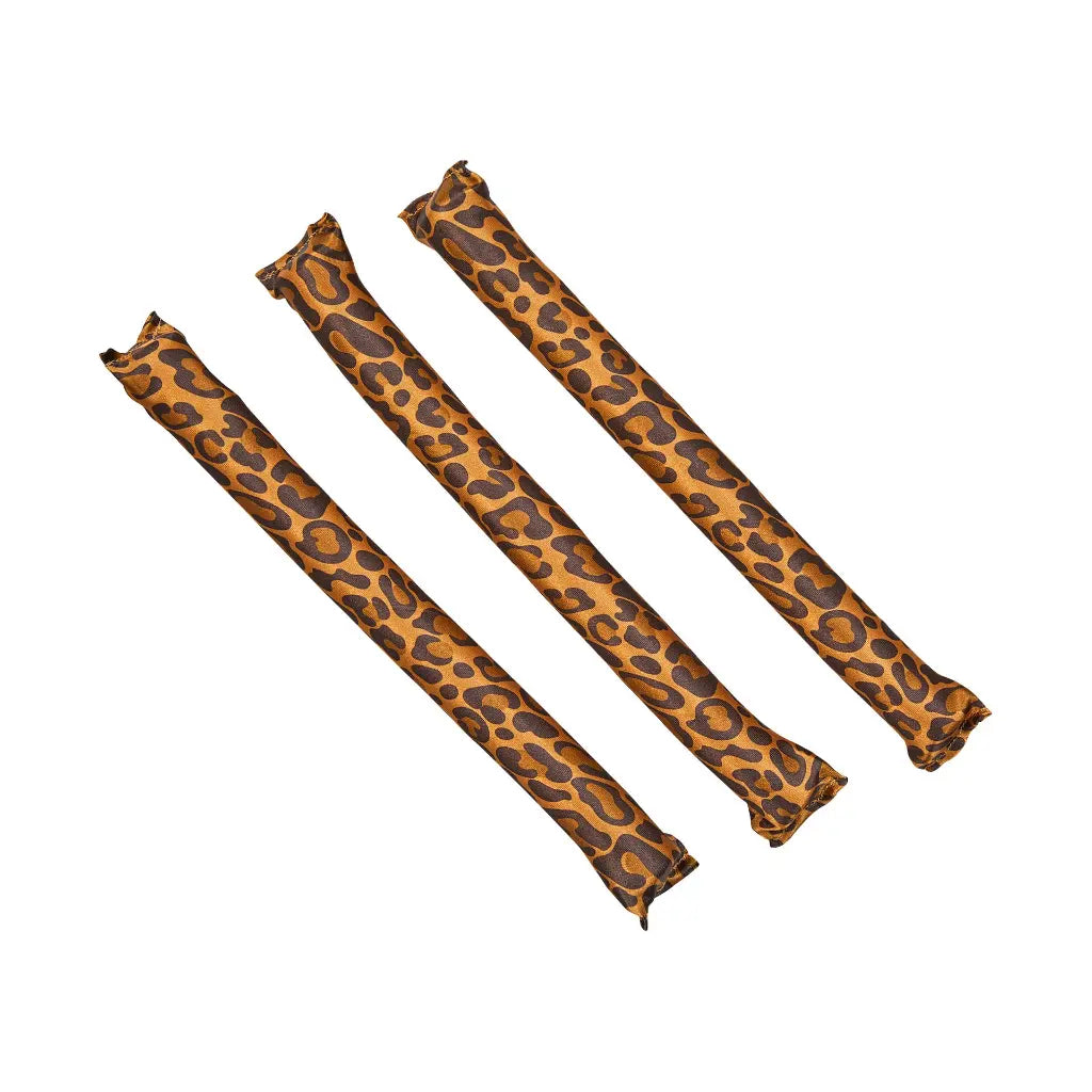 Close-up of silky animal print satin covering

