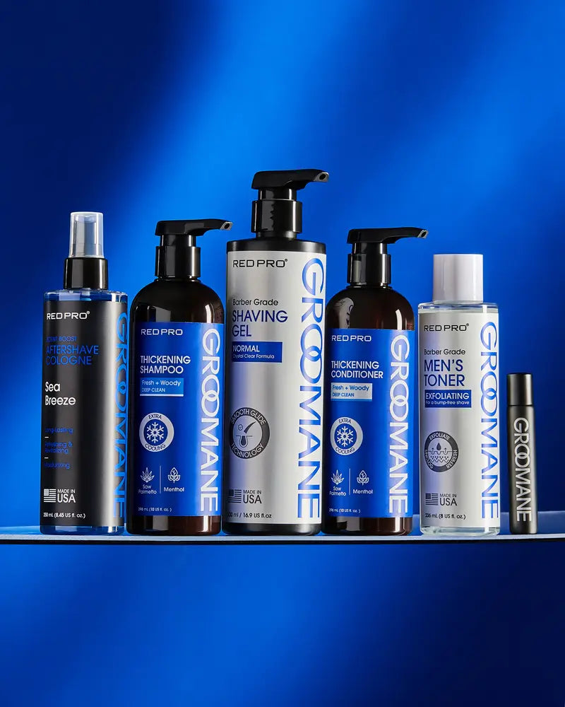 Collection of GroMane skincare and grooming products on a blue background