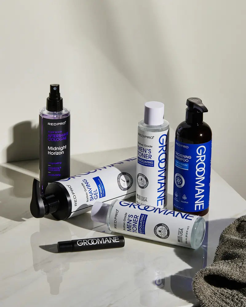 Grooming products including a spray bottle, gel, toner, and other items on a marble surface.