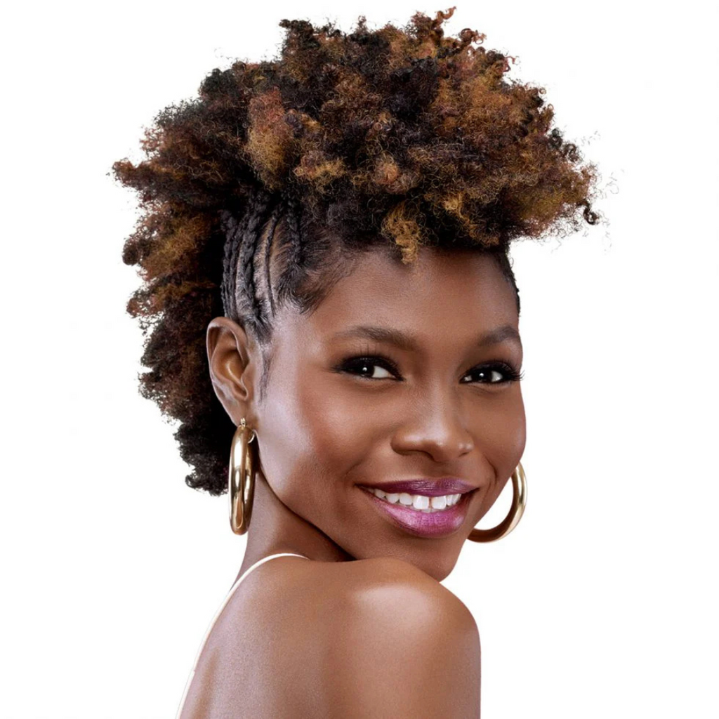 Woman with styled hair and hoop earrings on a white background