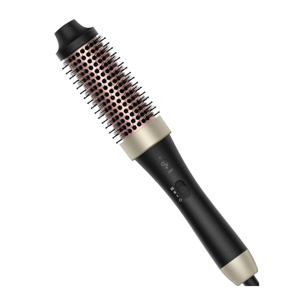 Heated round brush angled with ceramic barrel visible