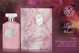 Pink perfume bottle and packaging with 'Lala' branding on a colorful background